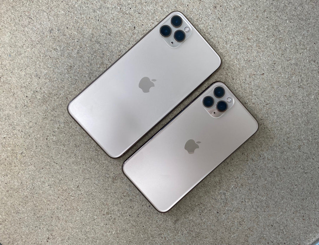 Gold iPhone 11 Pro Max beside gold iPhone 11 Pro size